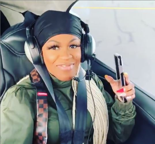 A picture of Lil Mo traveling through the private jet.